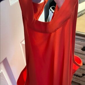 Vibrant Orange fun Sleeveless dress that can be dresses up or casual.